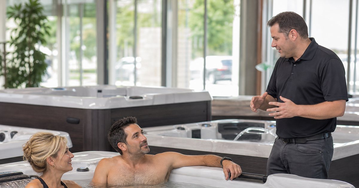 What is the best way to evaluate a hot tub dealer before signing a contract?